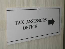 67bf57c6c3d8c_index 45 A sign that says tax assessors office
